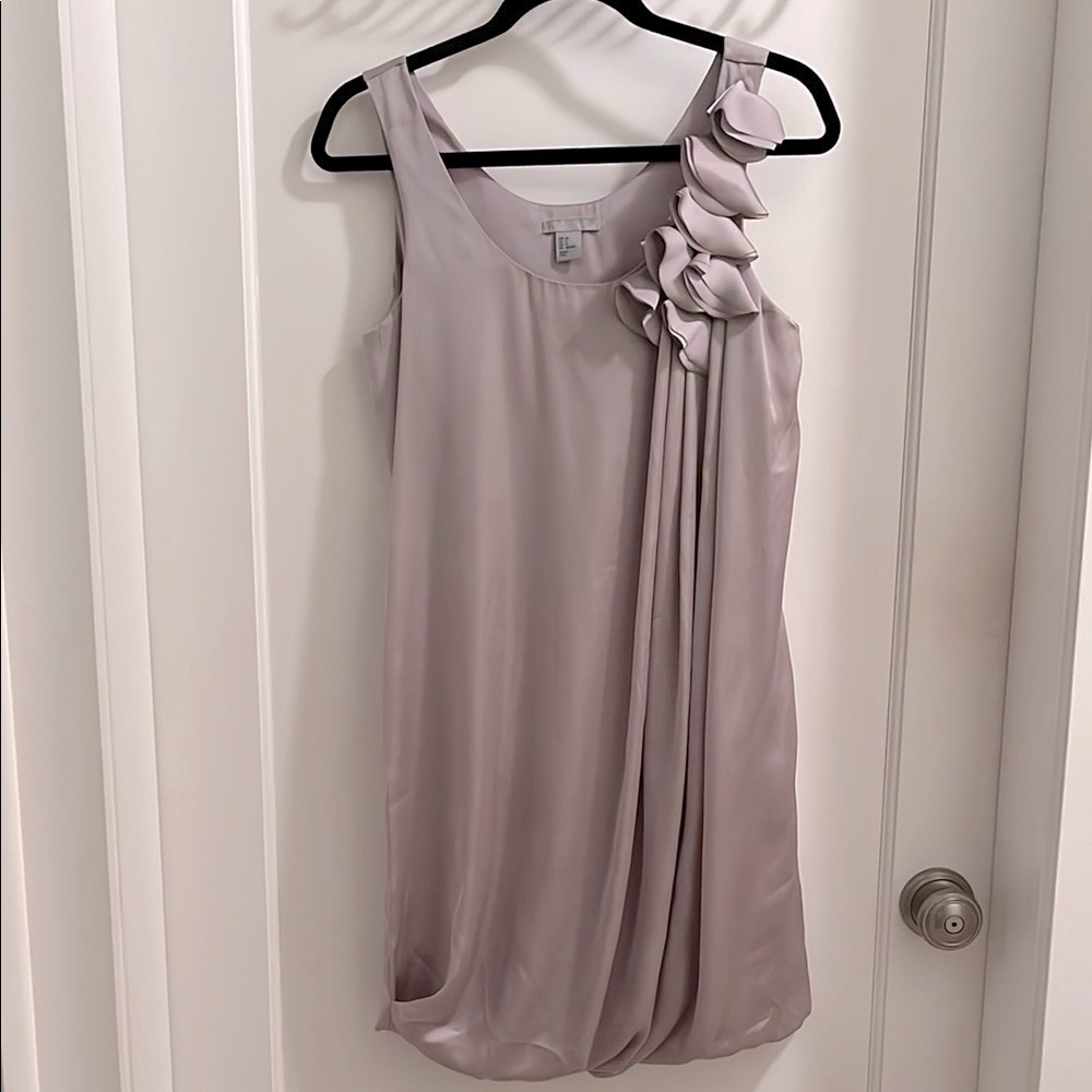Woman’s Elegant Silver Sleeveless Bubble Dress with flower embellishment